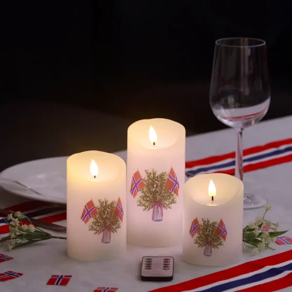 17.mai_dekorio-UndrumDesign Bilde av tre Kubelys i mørket med 17.mai tema merker og bord. Dekorio i samarbeid med UndrumDesign i laging av nettside.